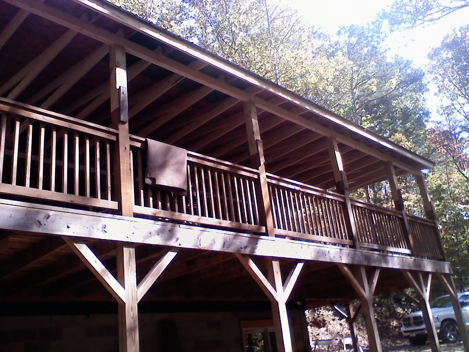 Timber framing under a new elevated porch and deck — Roof Leak Repair in Buchtel by Roofing Brothers